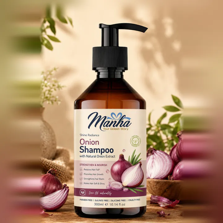 Manha Onion Shampoo pump bottle surrounded by red onions
